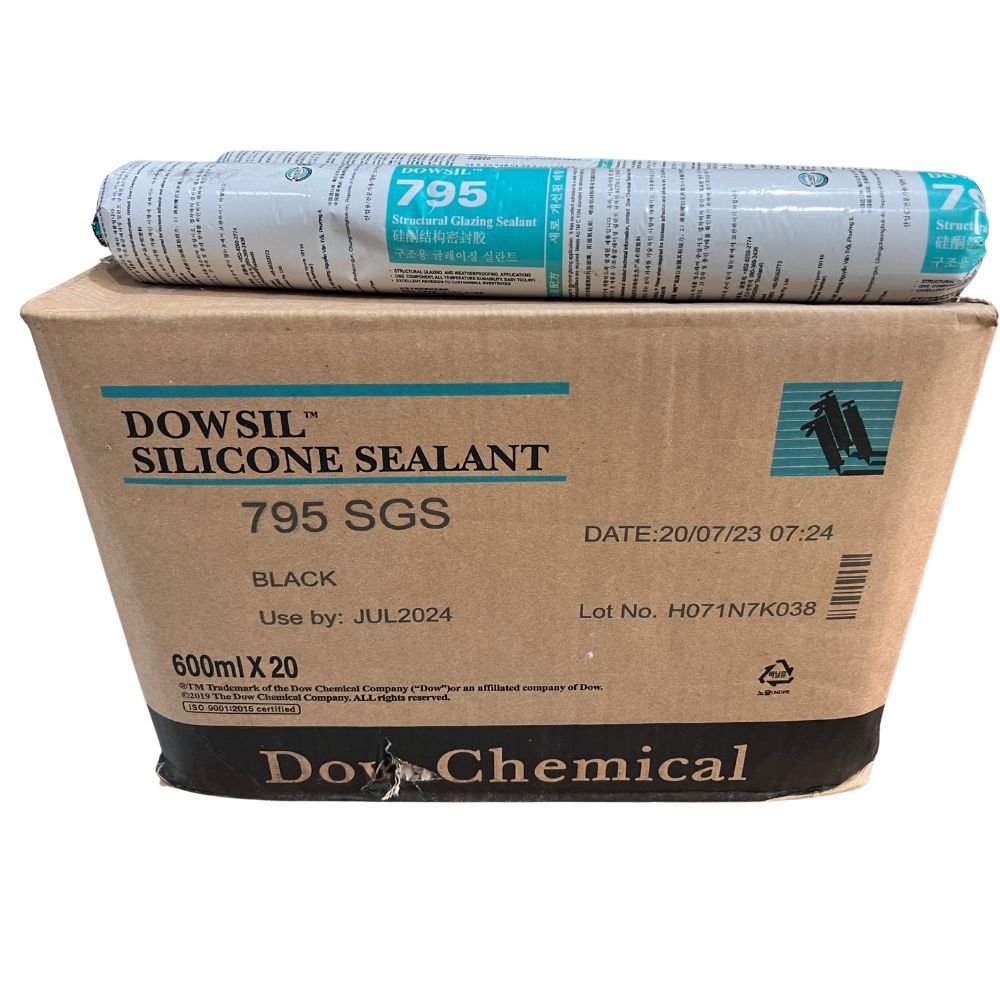 Application of Silicone Dow-Corning sealant to a window frame, ensuring a weather-resistant and durable bond.